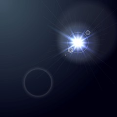 Image showing Shiny light lens flare on dark blue background