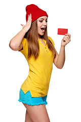 Image showing Surprised teen funky girl with credit card