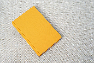 Image showing Yellow book on the table