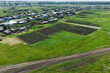 Image showing Novikovo village and fields set with potato