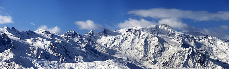 Image showing Panoramic view on snowy mountains in nice sunny day