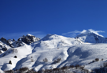 Image showing Mount Tetnuldi and off-piste slope with track from ski and snowb