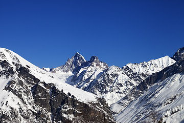 Image showing Mountain peaks in winter at sunny day