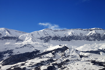 Image showing Snowy mountains and blue sky at nice sun day