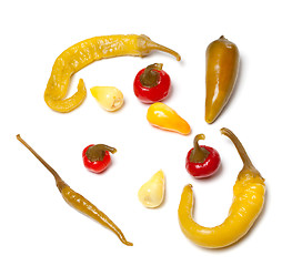 Image showing Mix of hot marinated turkish peppers on white