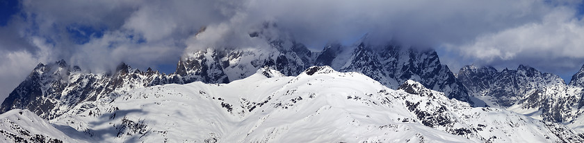 Image showing Panoramic view on Mounts Ushba and Chatyn in haze at sunny day
