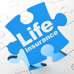 Image showing Insurance concept: Life Insurance on puzzle background