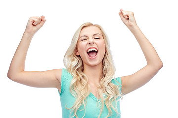 Image showing happy young woman or teen girl celebrating victory