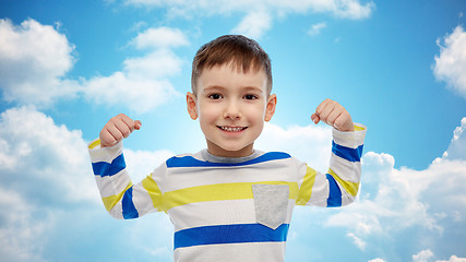 Image showing happy smiling little boy with raised hand