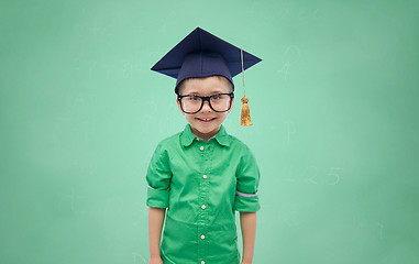 Image showing happy boy in bachelor hat or mortarboard