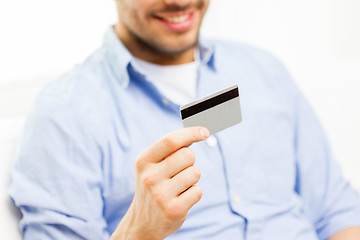 Image showing close up of man with credit card