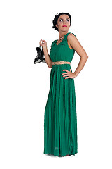 Image showing Pretty young woman in long green dress