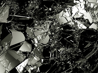 Image showing Shattered glass: sharp Pieces on black