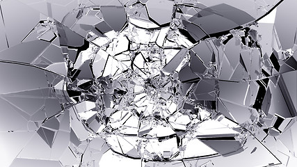 Image showing Pieces of splitted or cracked glass on black