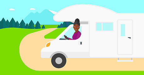 Image showing Woman driving motor home.