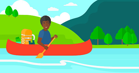 Image showing Man canoeing on the river.