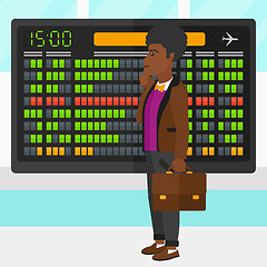 Image showing Man looking at schedule board.