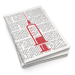 Image showing Medicine concept: Syringe on Newspaper background