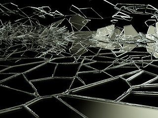 Image showing Broken and cracked glass on black