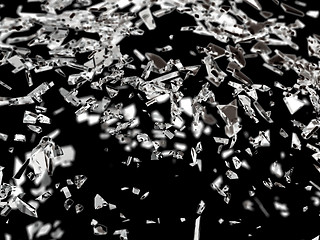 Image showing Sharp pieces of smashed glass isolated 