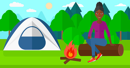 Image showing Woman sitting at camp.