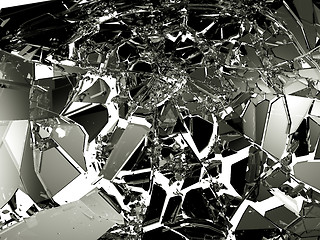 Image showing Sharp Pieces of shattered black glass on white