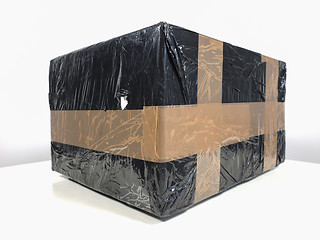 Image showing Black packet parcel