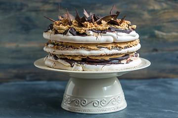 Image showing Cake of meringue, cream with coffee and chocolate.