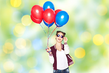 Image showing happy teenage girl with helium balloons