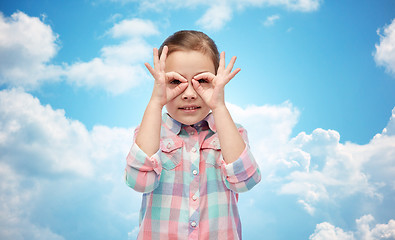 Image showing happy little girl making faces and having fun