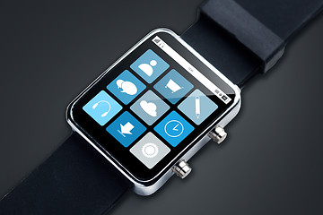 Image showing close up of smart watch with menu icons on screen