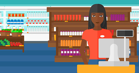 Image showing Saleslady standing at checkout.