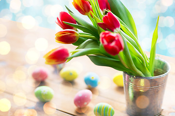 Image showing close up of easter eggs and flowers in bucket