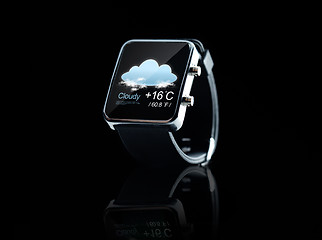 Image showing close up of black smart watch with weather app