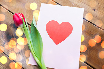 Image showing close up of flowers and greeting card with heart