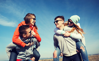 Image showing happy friends in shades having fun outdoors