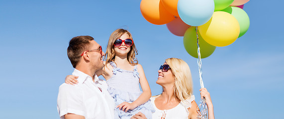 Image showing family with colorful balloons