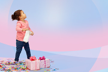 Image showing happy little baby girl with birthday presents