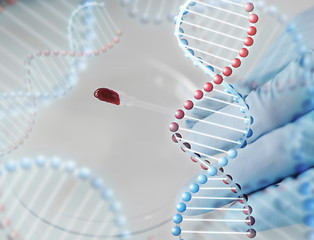 Image showing close up of scientist with blood sample in lab