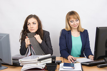 Image showing Female colleagues in the office, one hates to work, like a second job