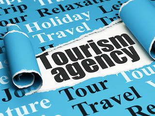 Image showing Travel concept: black text Tourism Agency under the piece of  torn paper