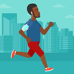 Image showing Man jogging with earphones and smartphone.