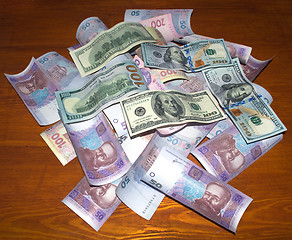 Image showing Ukrainian money US dollars