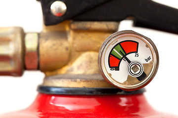 Image showing Dusty fire extinguisher fully charged, selective focus