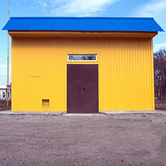 Image showing building blue yellow