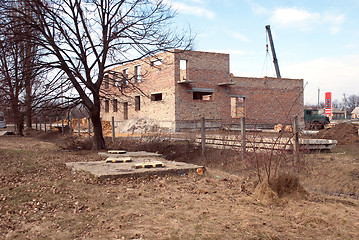 Image showing construction of a brick building