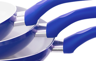 Image showing Set of three frying pans, blue