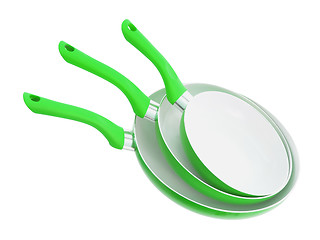 Image showing Set of three frying pans, green