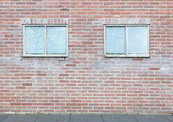 Image showing Old vintage brick wall with windows