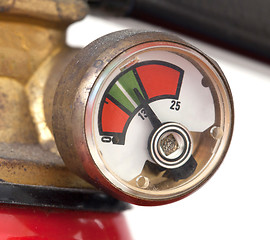 Image showing Dusty fire extinguisher fully charged, selective focus